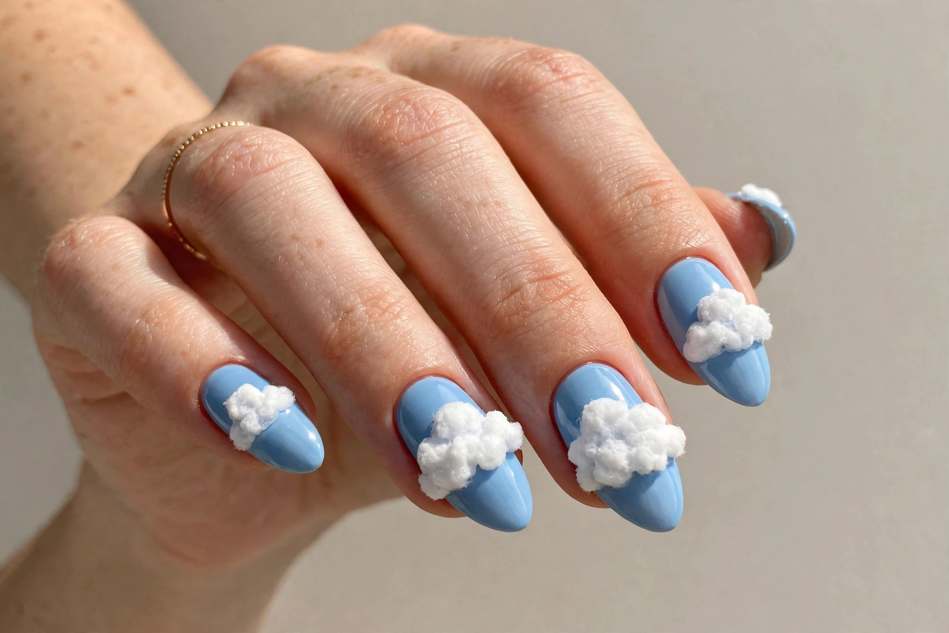 3D cloud nails with raised fluffy white clouds on sky blue nails
