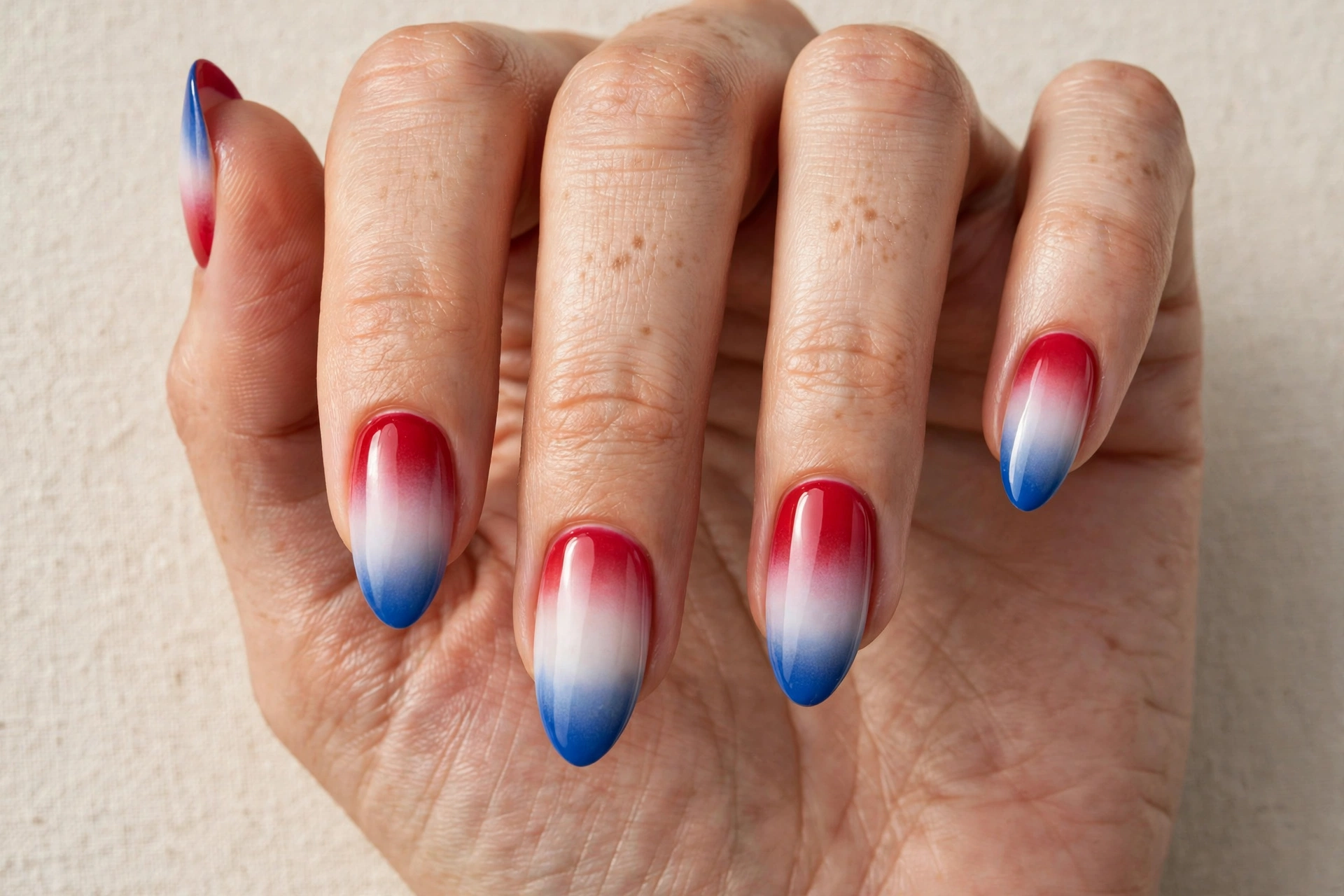 Red white and blue gradient ombre manicure