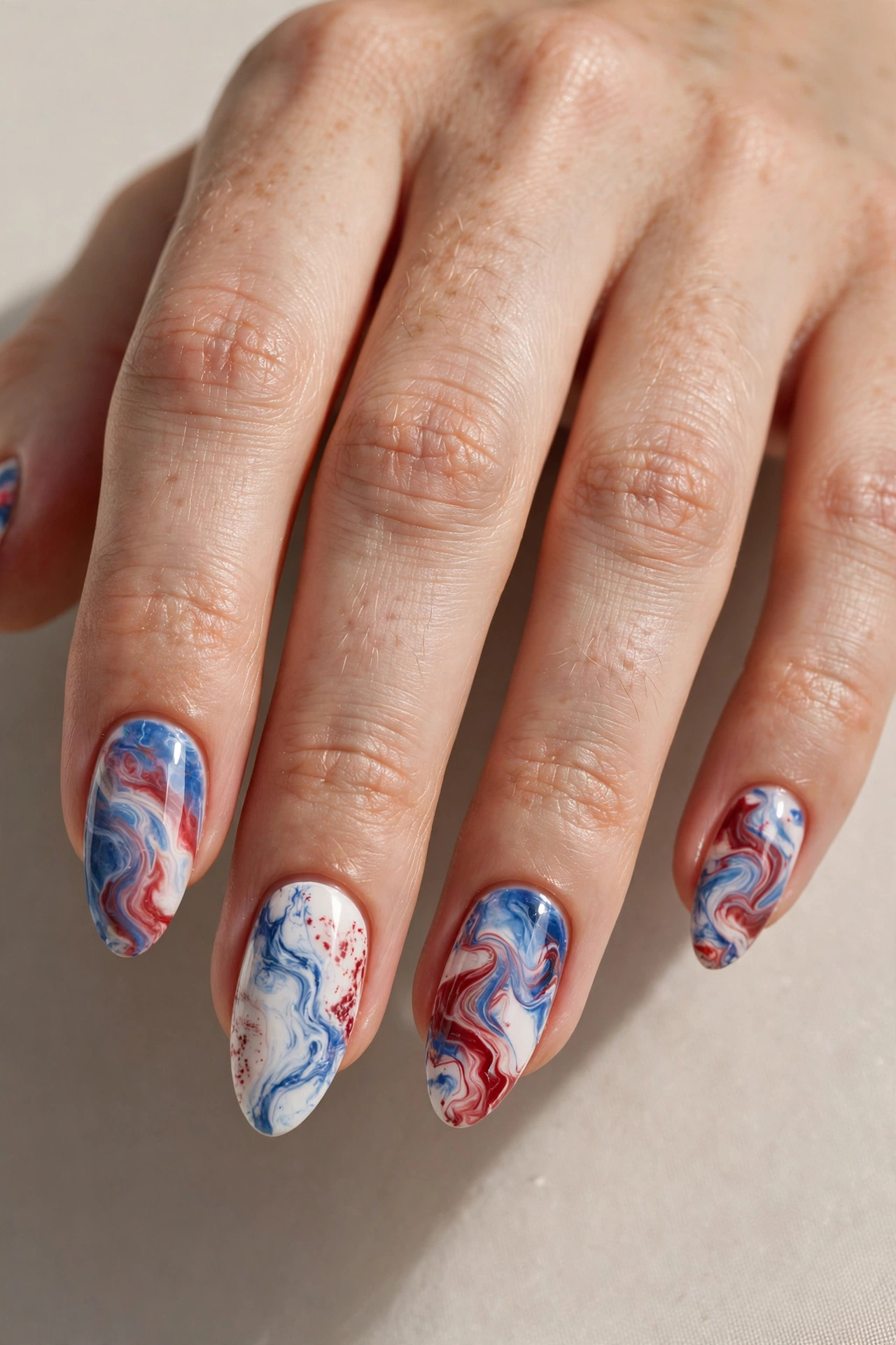 Red white and blue marble nail art