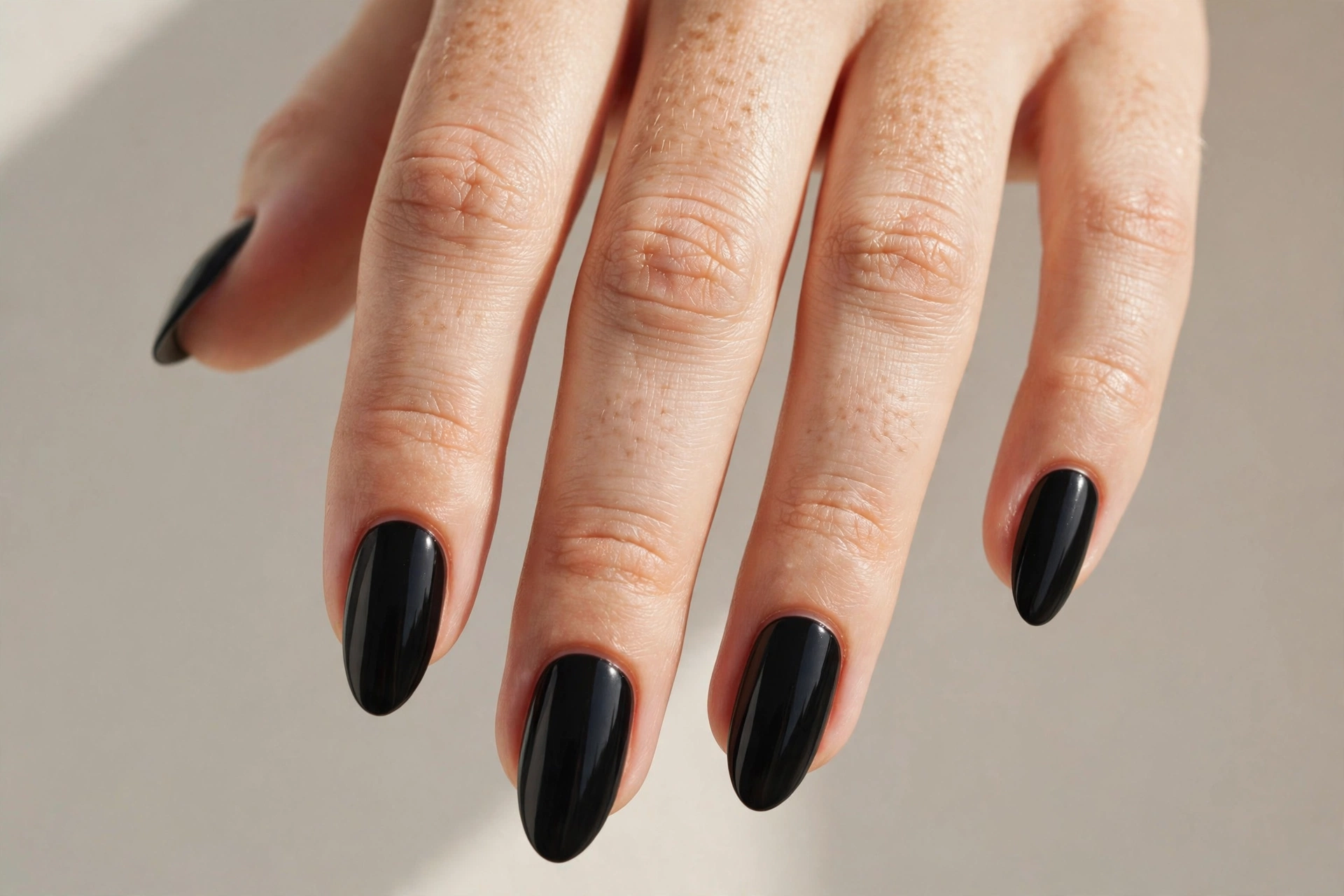 Jet black solid manicure with glossy finish