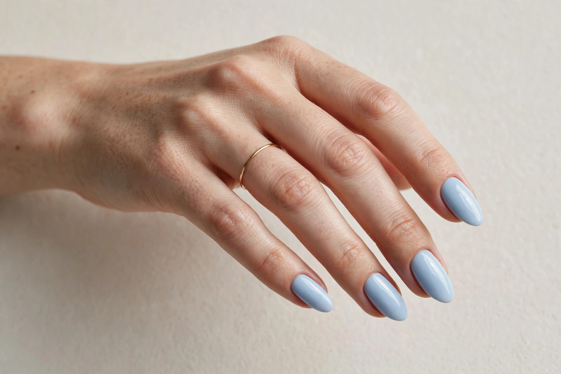 Baby blue manicure with smooth finish