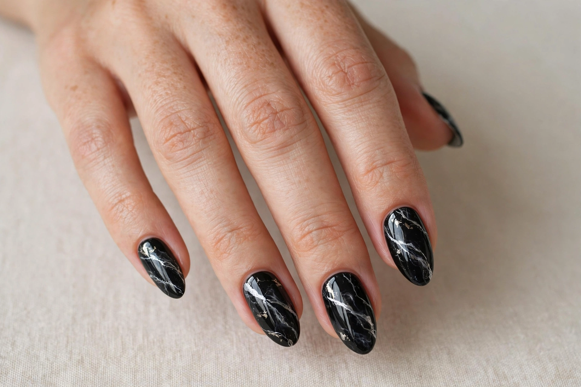 Black marble nails with silver veining