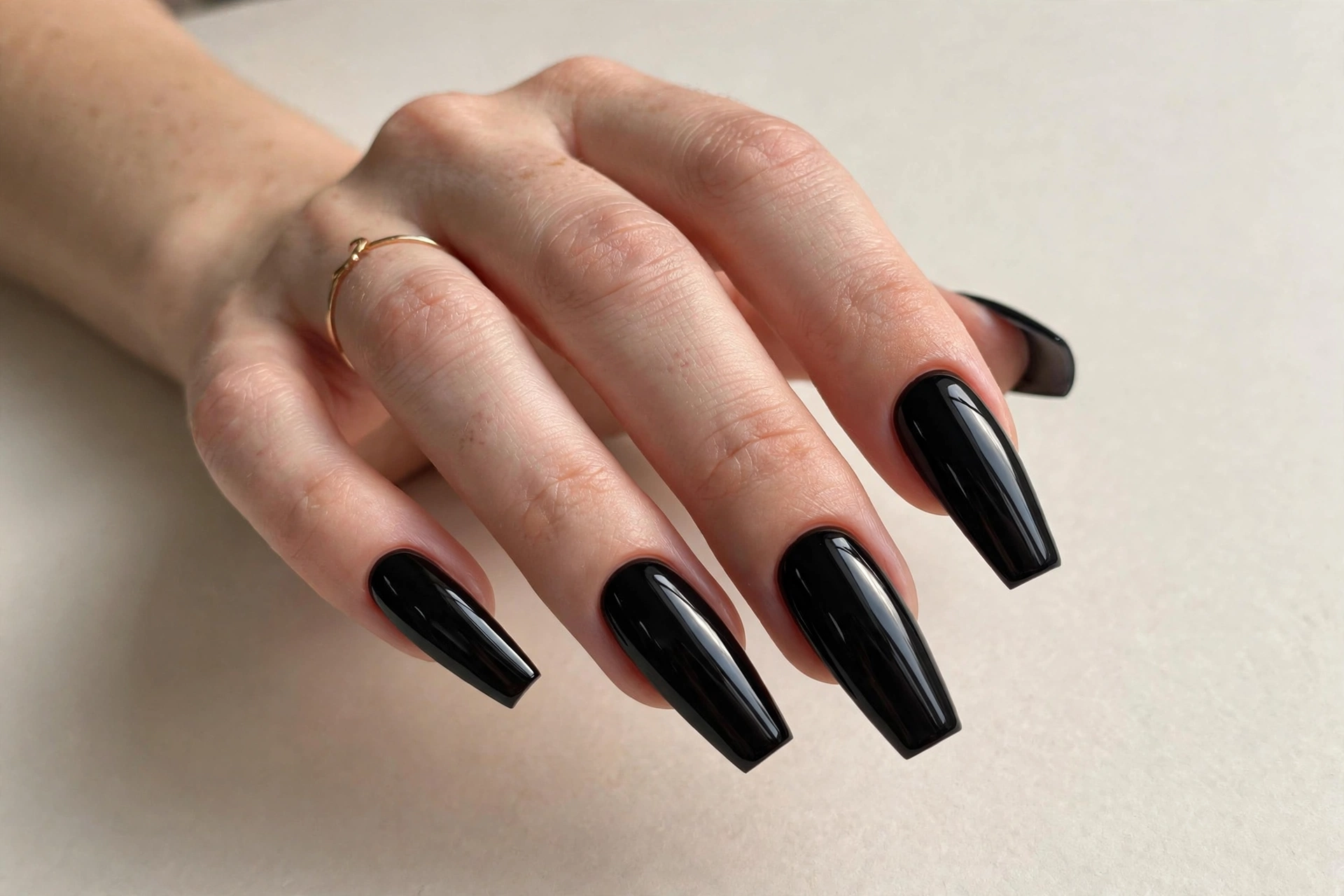 Long black coffin shaped nails with glossy finish