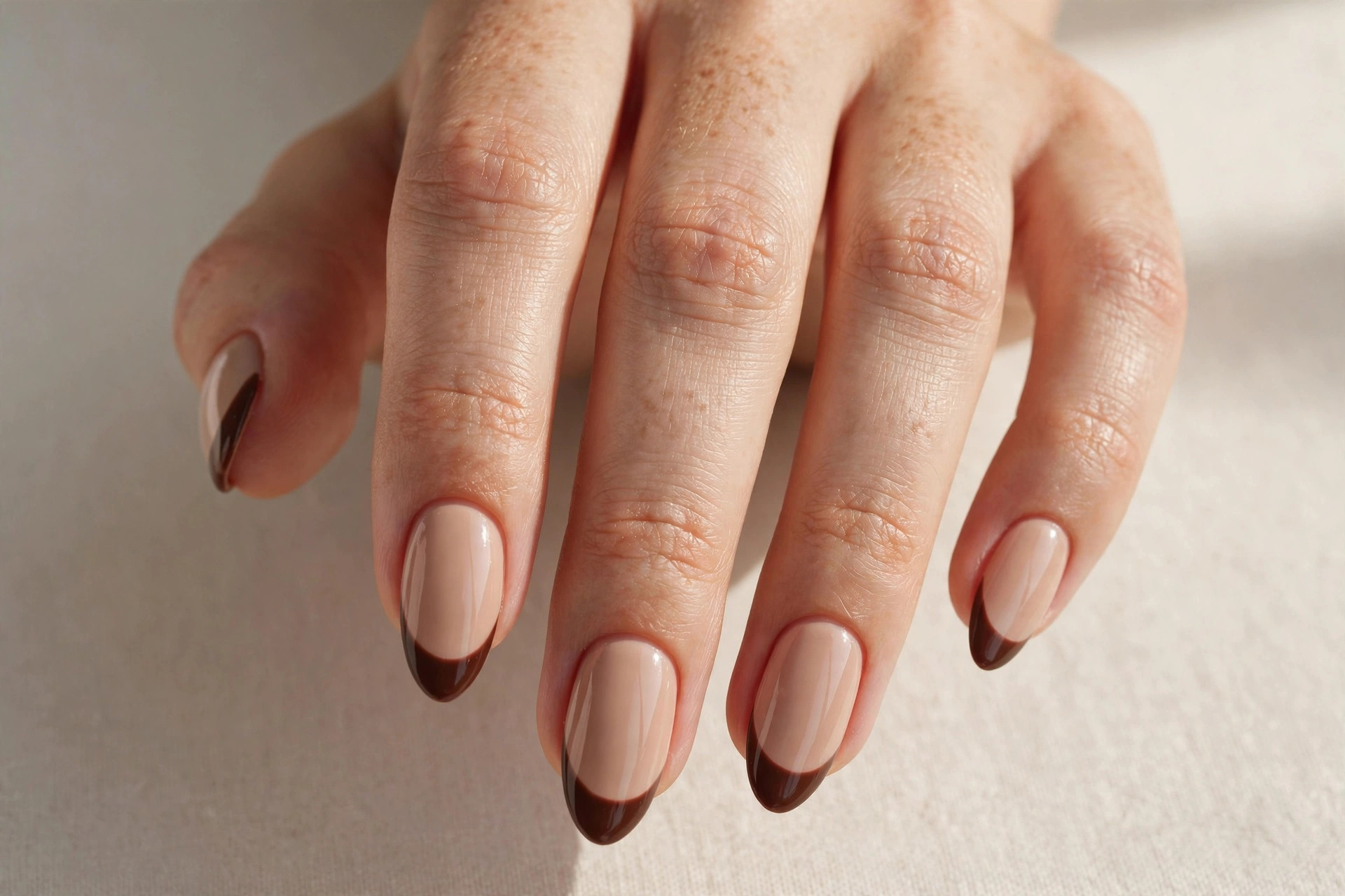 Mocha brown French tip nails