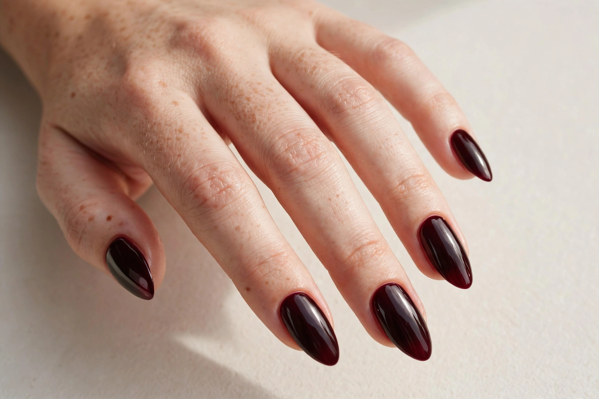 Deep oxblood dark cherry glossy manicure