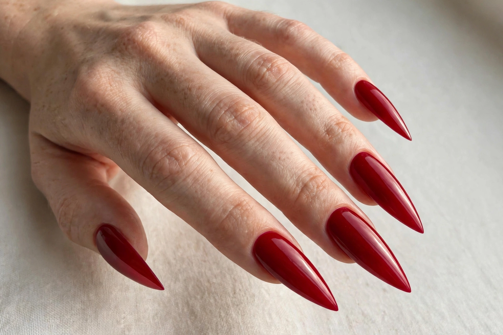 Long almond cherry red manicure