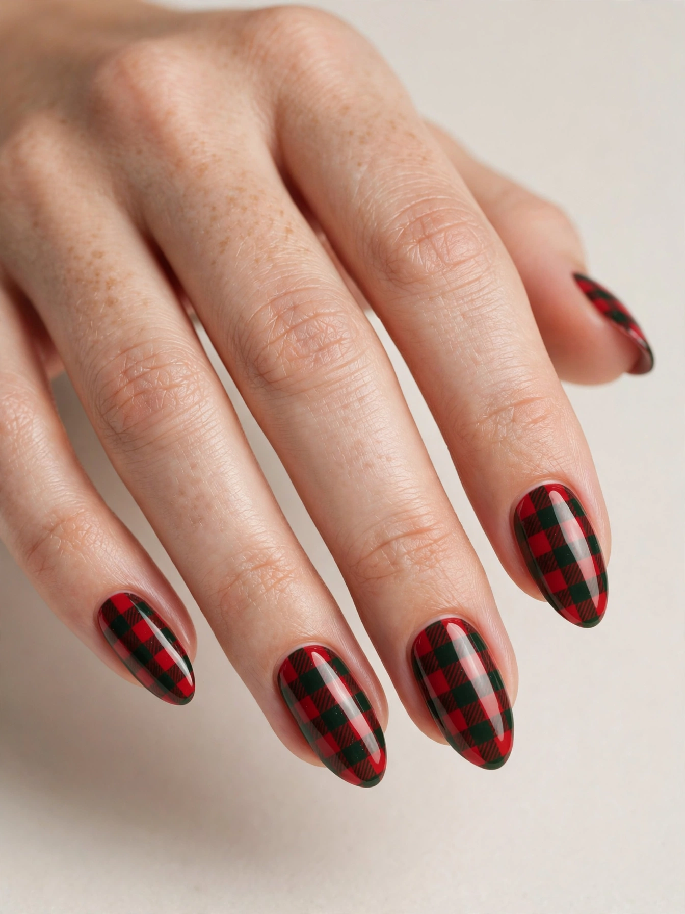 Red and green buffalo plaid Christmas nail art