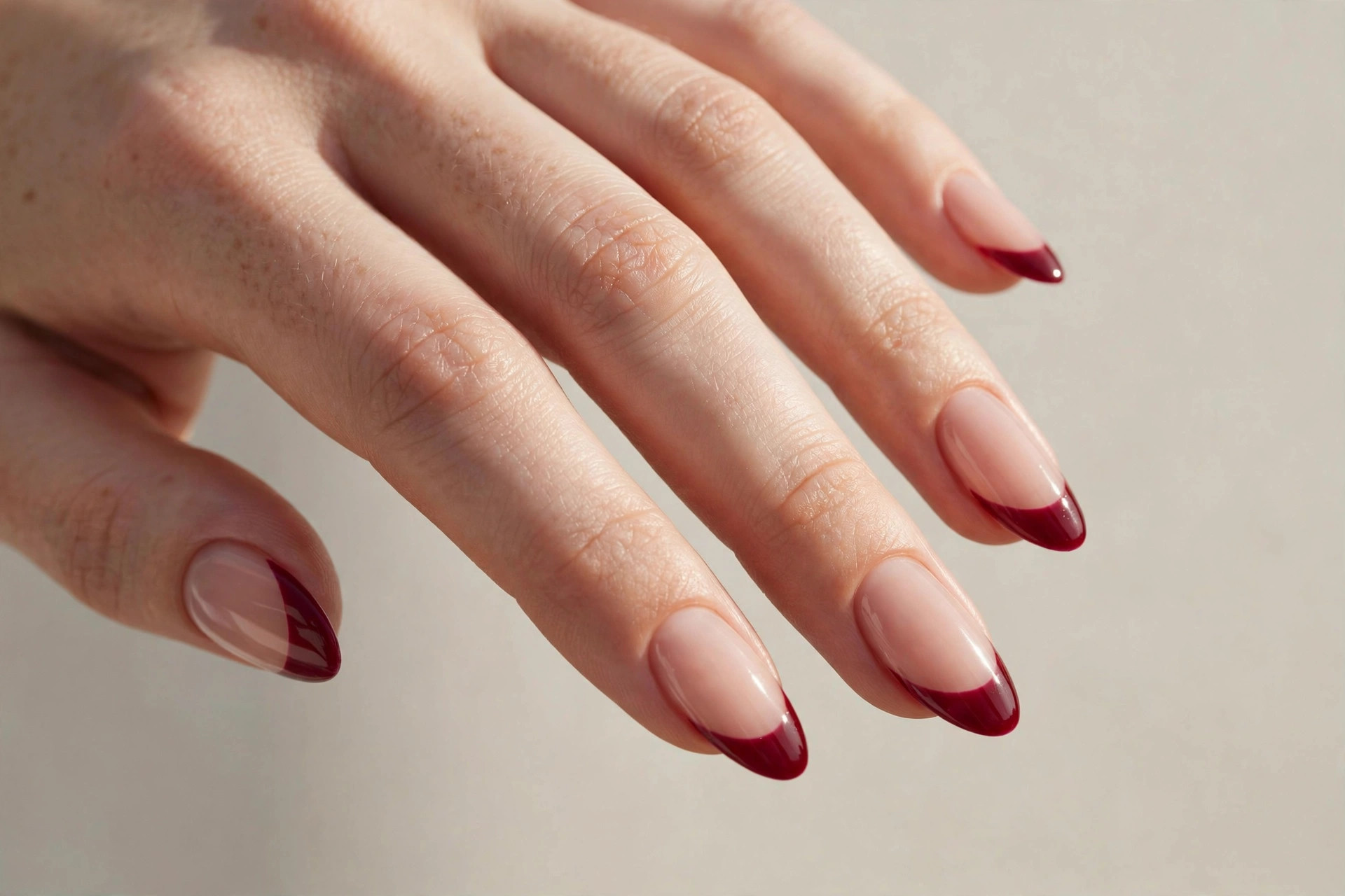 Cranberry red French tip Thanksgiving nails