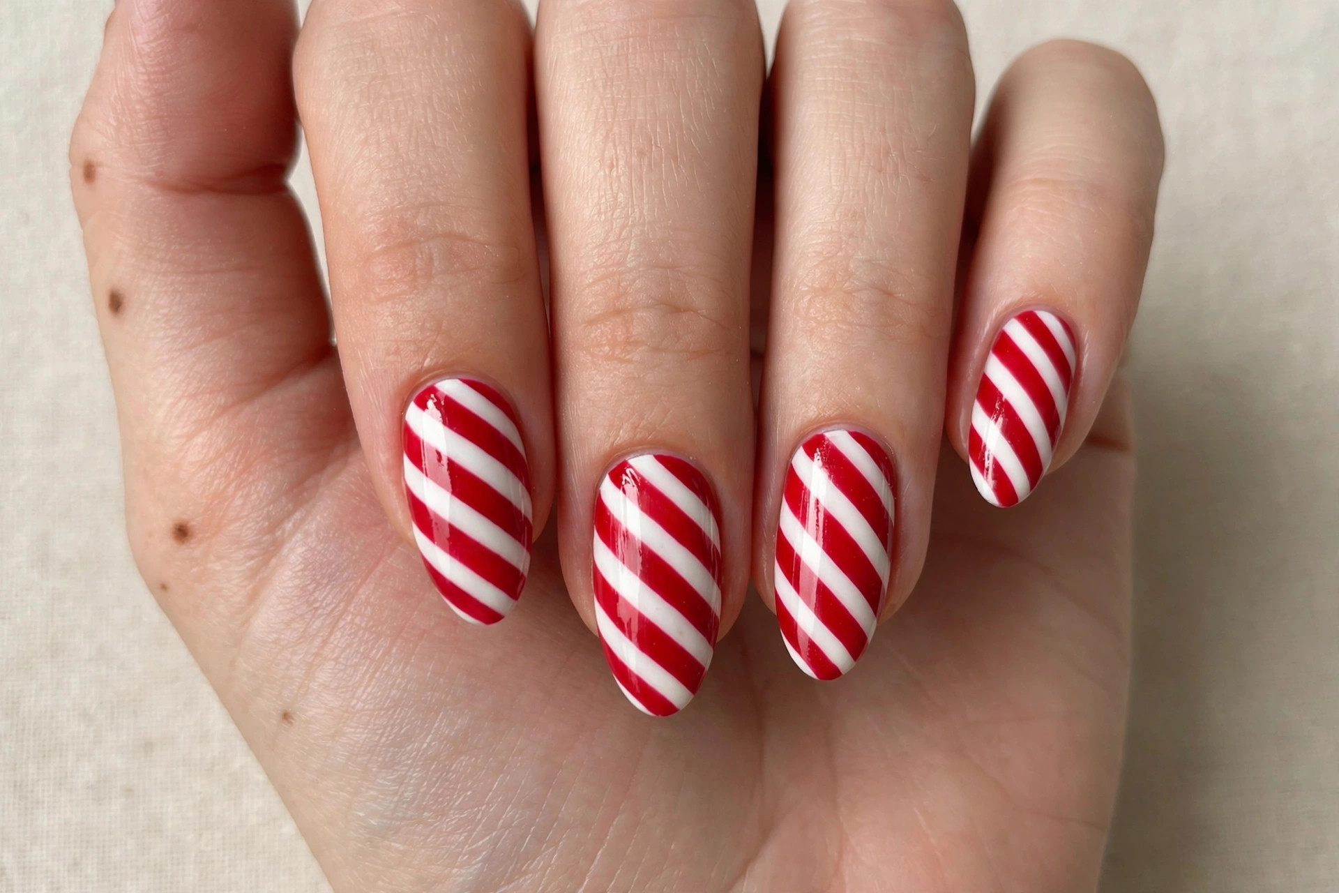 Candy cane red and white striped nail art