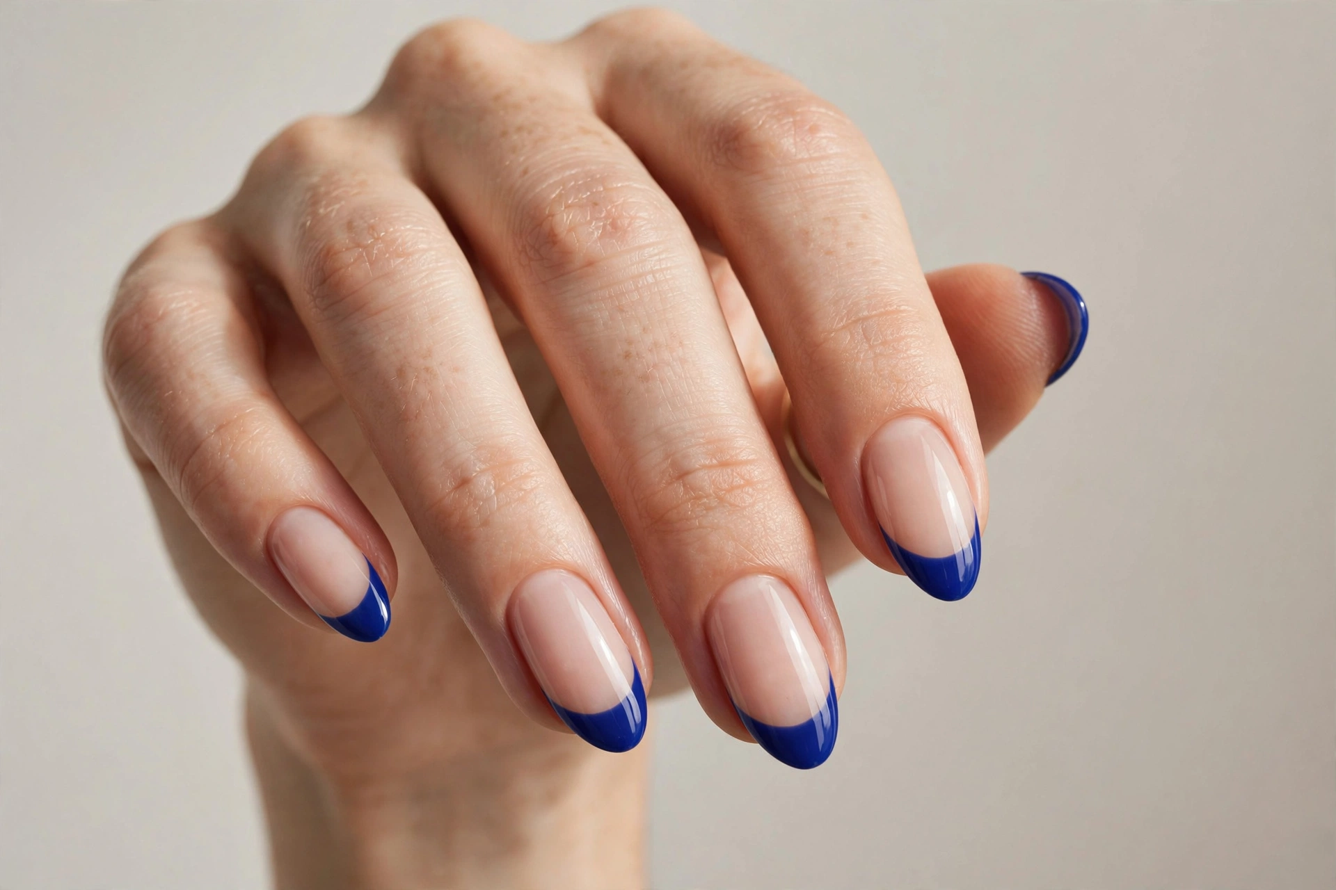 Leopard print French tip manicure on almond nails
