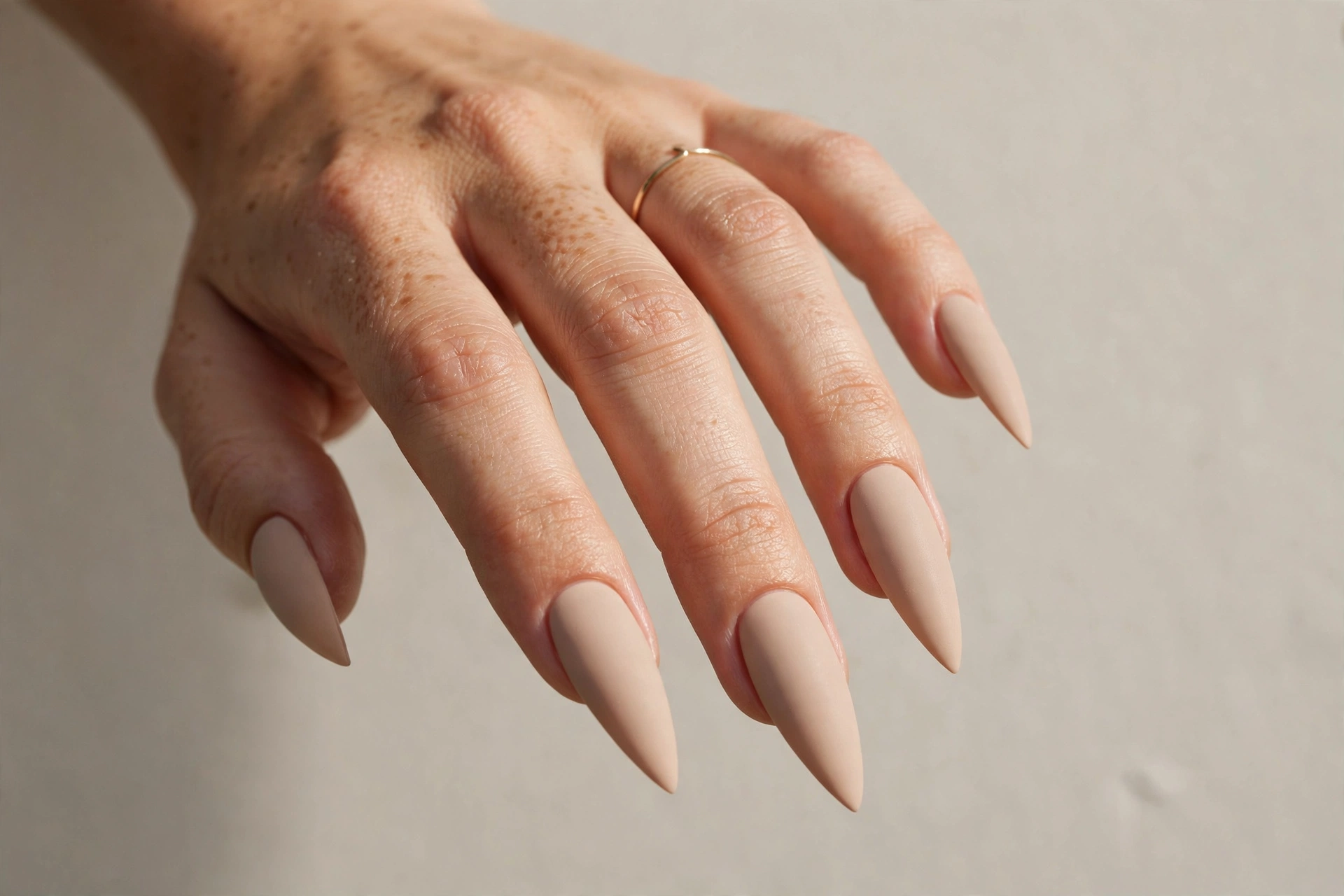 Matte nude beige stiletto nails
