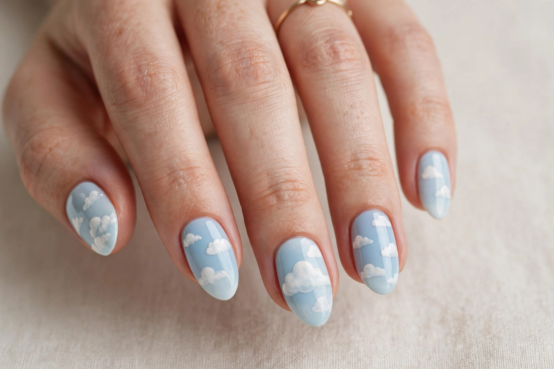 White clouds on light blue sky nails