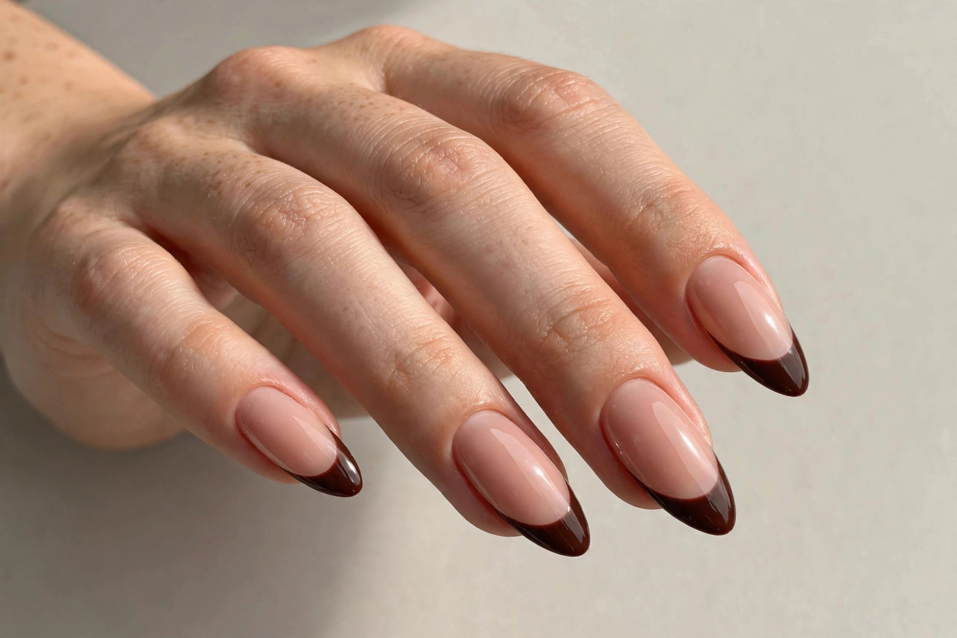 French manicure with deep chocolate brown tips