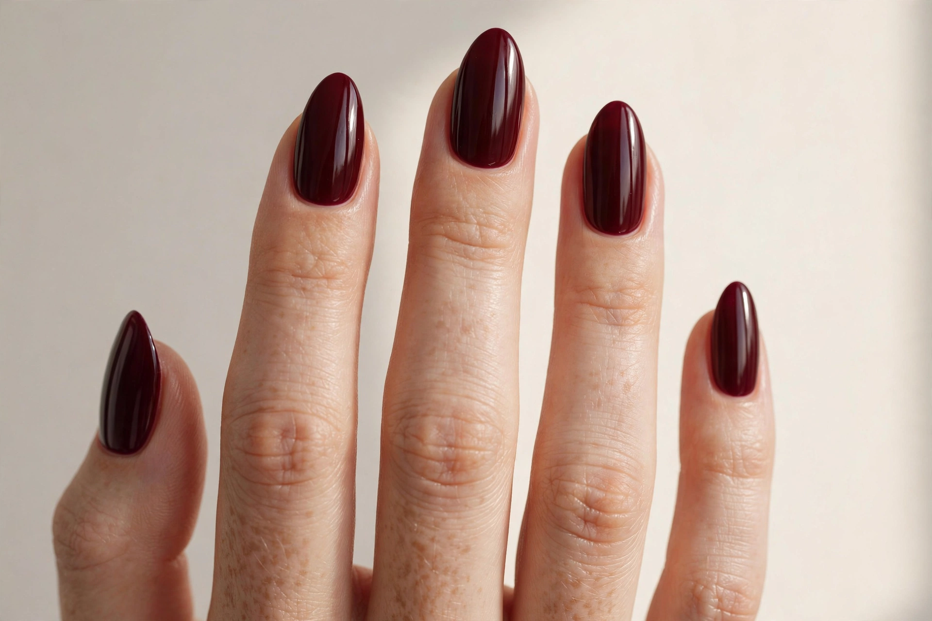 Deep burgundy wine glossy manicure