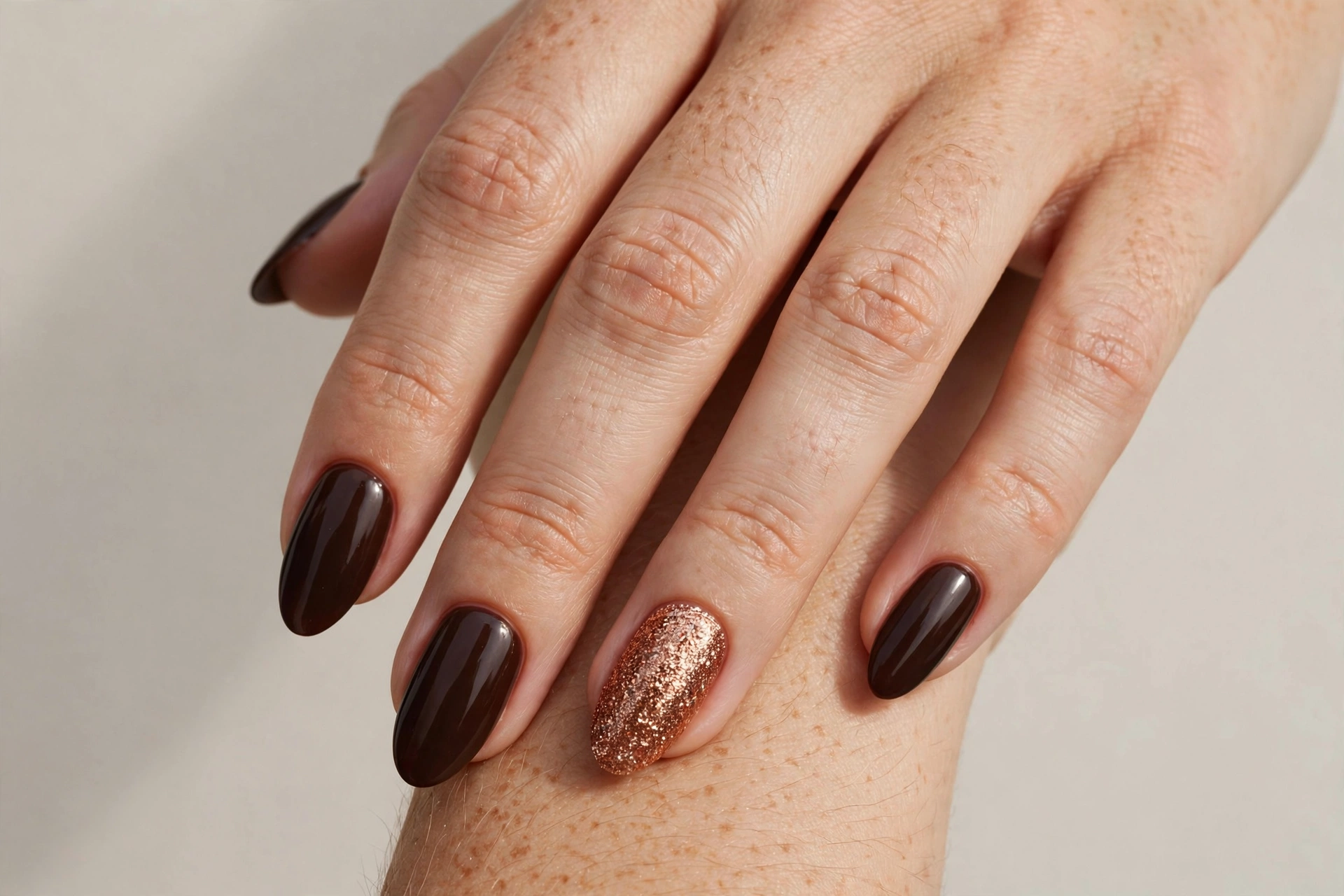 Espresso brown nails with copper glitter accent