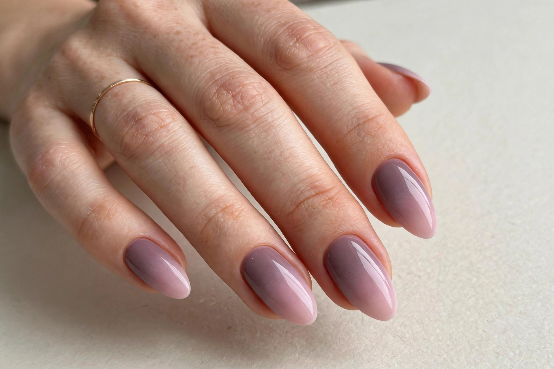 Mauve dusk ombre nails blending into pale pink