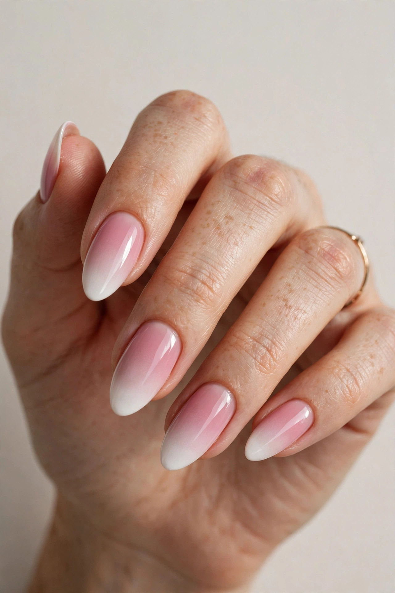 Baby boomer pink and white gel gradient nail design