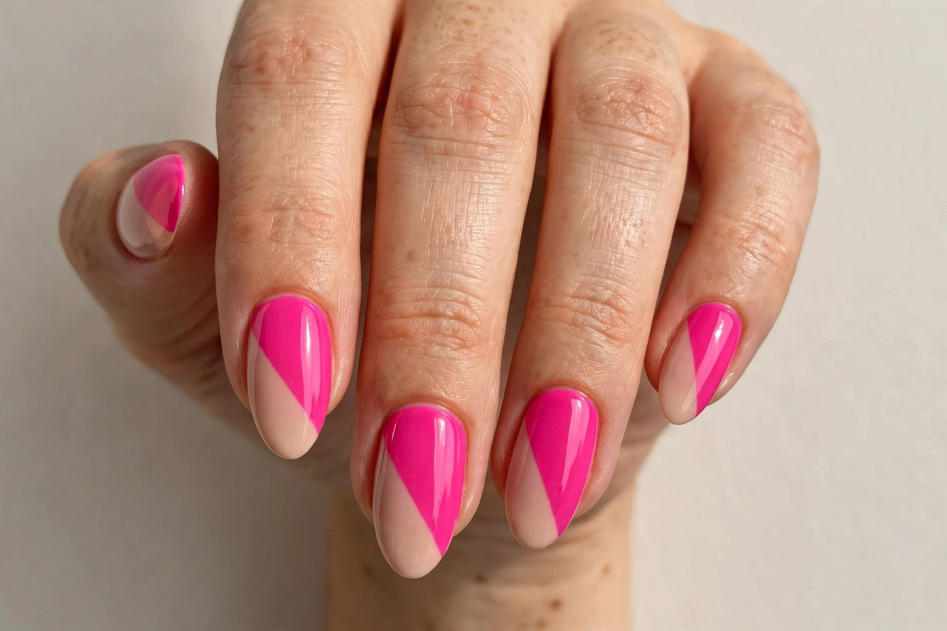 Hot pink nails fading into white tips