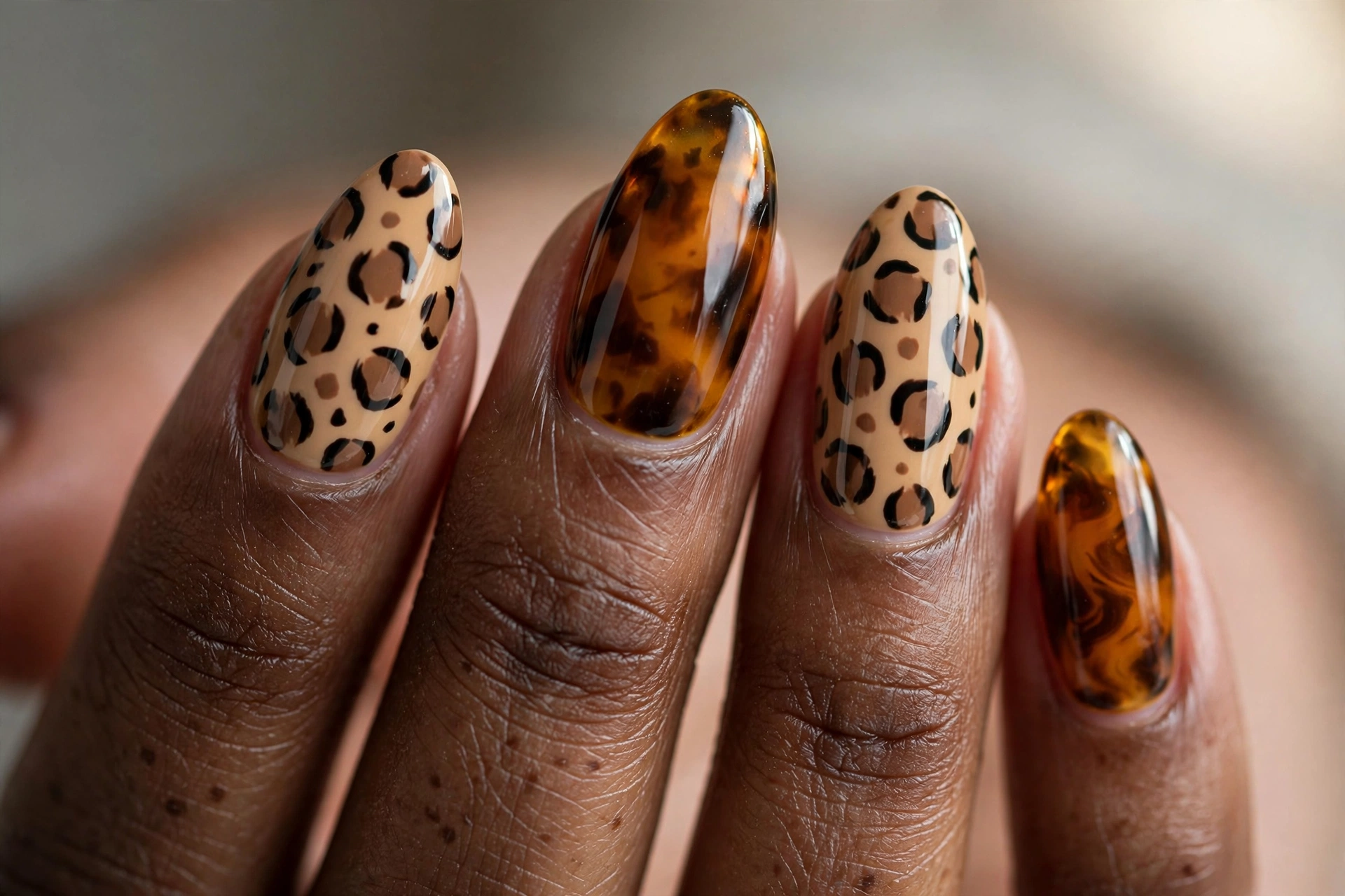 Alternating leopard print and amber tortoiseshell nails