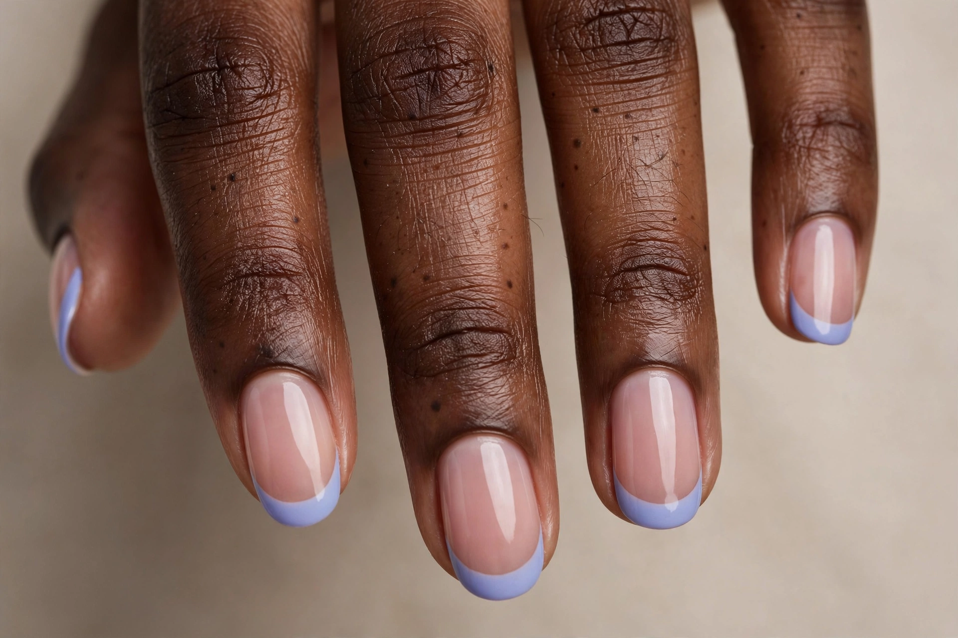 Periwinkle blue French tips on sheer nude base