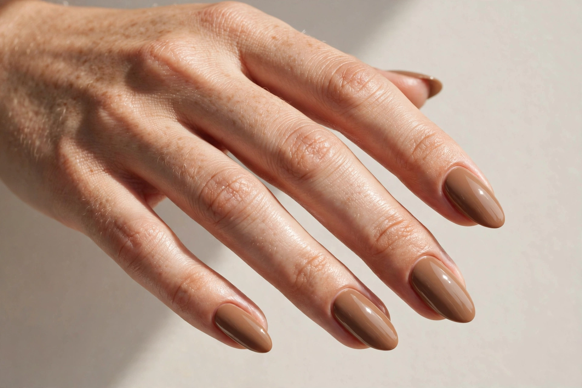 Cafe au lait brown neutral nail design