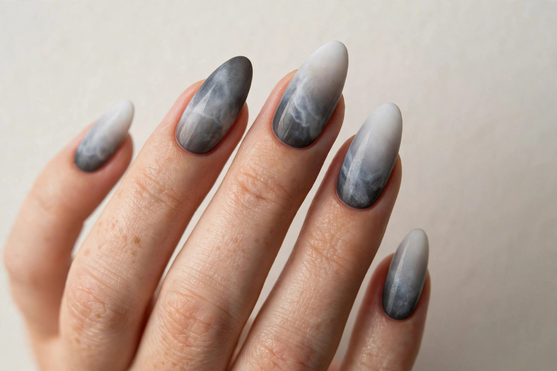 Grey-to-white fog ombre nails, cool neutral gradient manicure