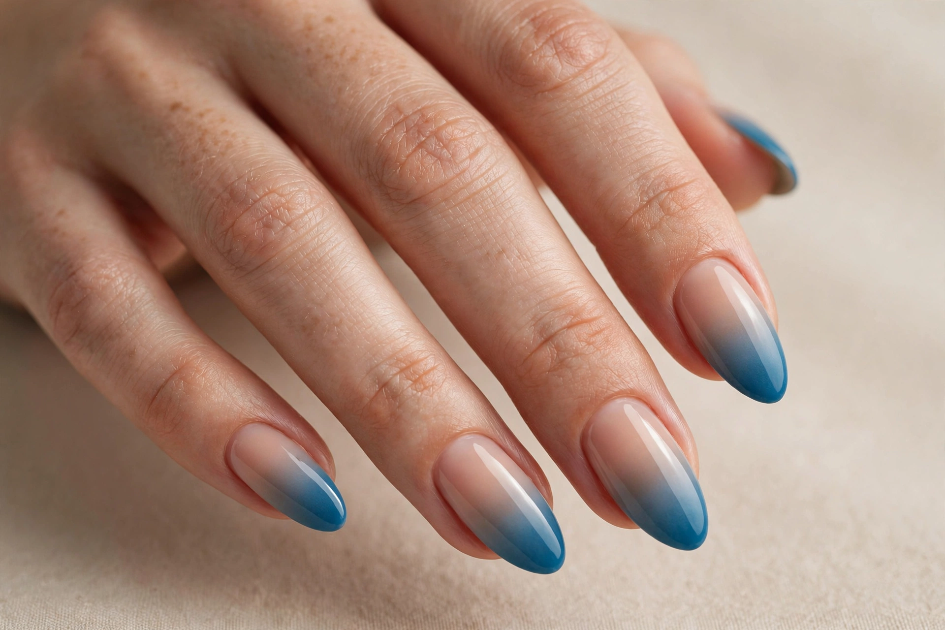 Ocean blue to nude ombre nails, beachy blue gradient manicure