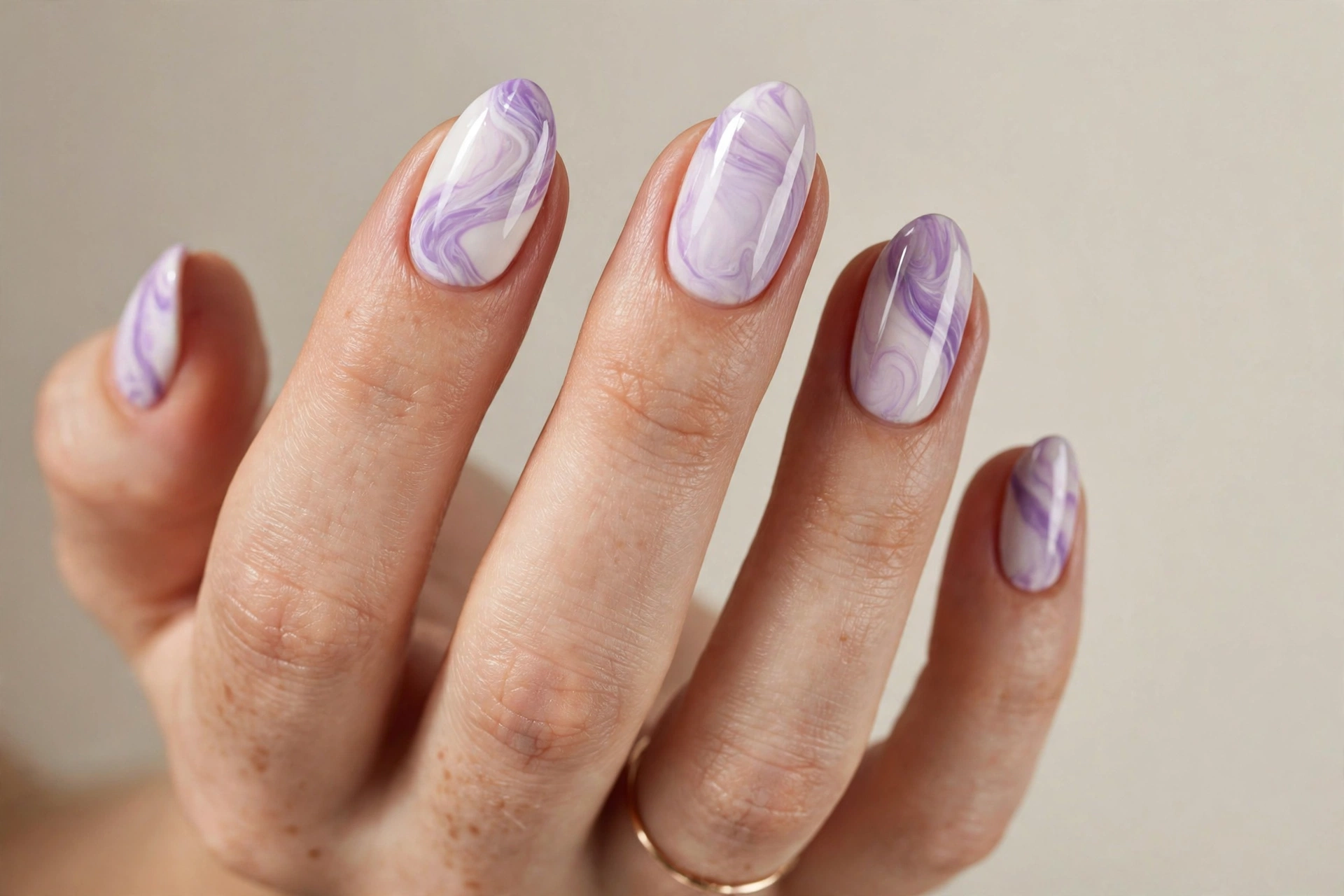 Lilac and white marble swirl pastel manicure