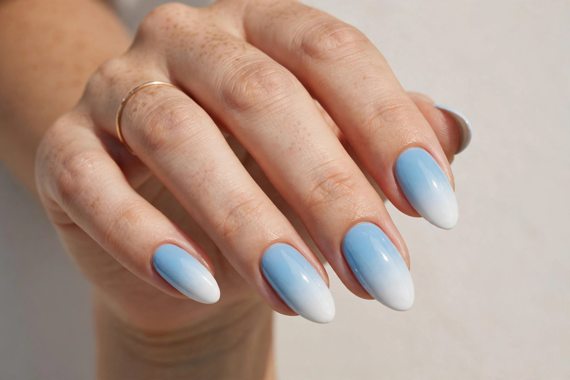 Sky blue to white ombre gradient pastel manicure
