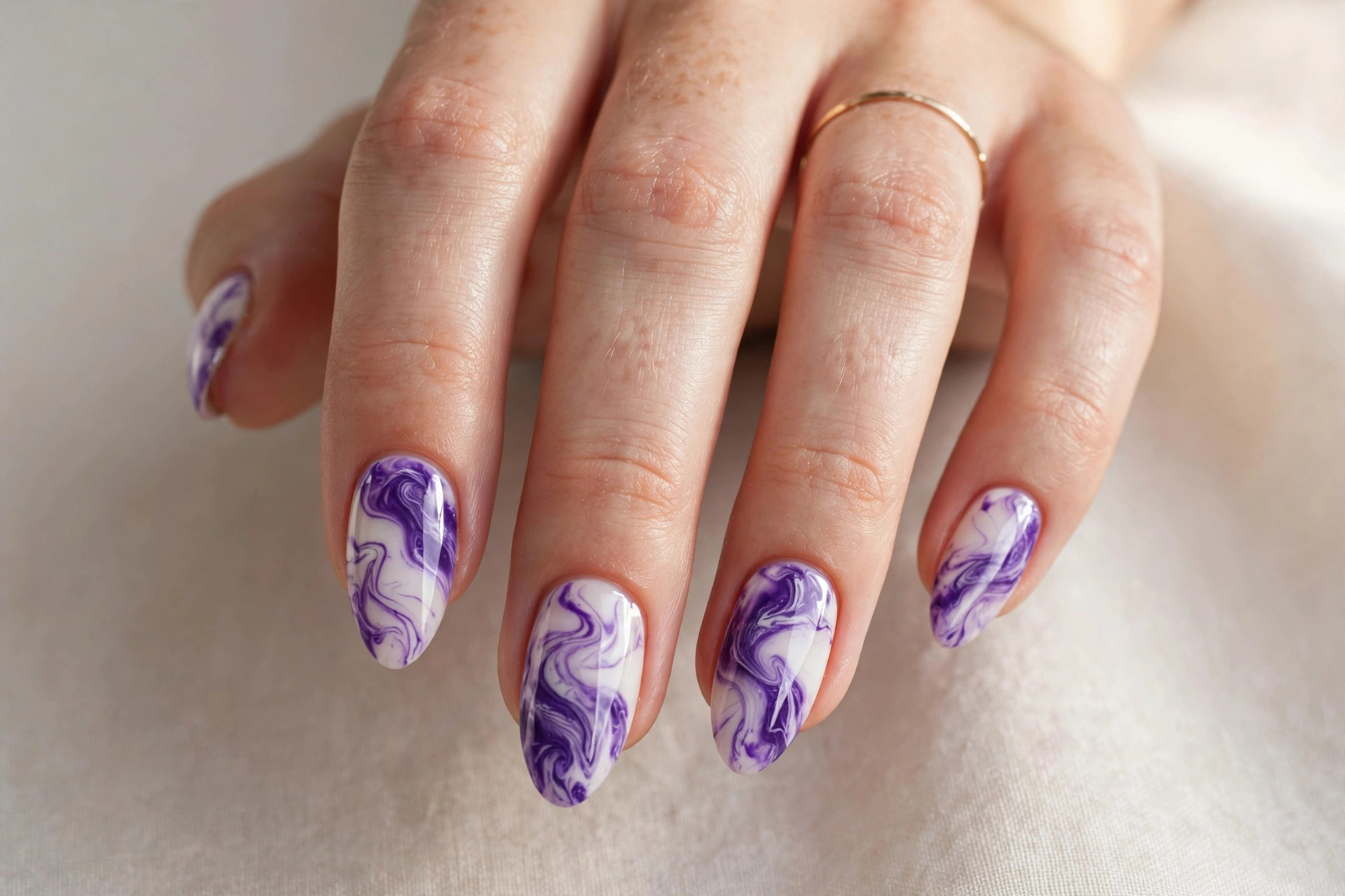 Violet and white marble nail art manicure