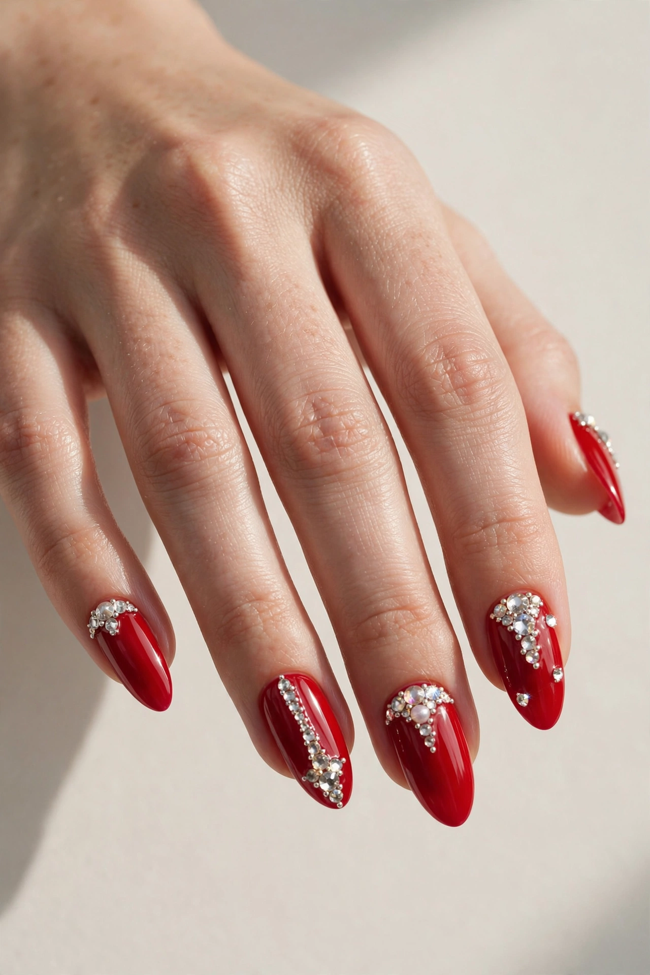 Red nails with crystal rhinestones