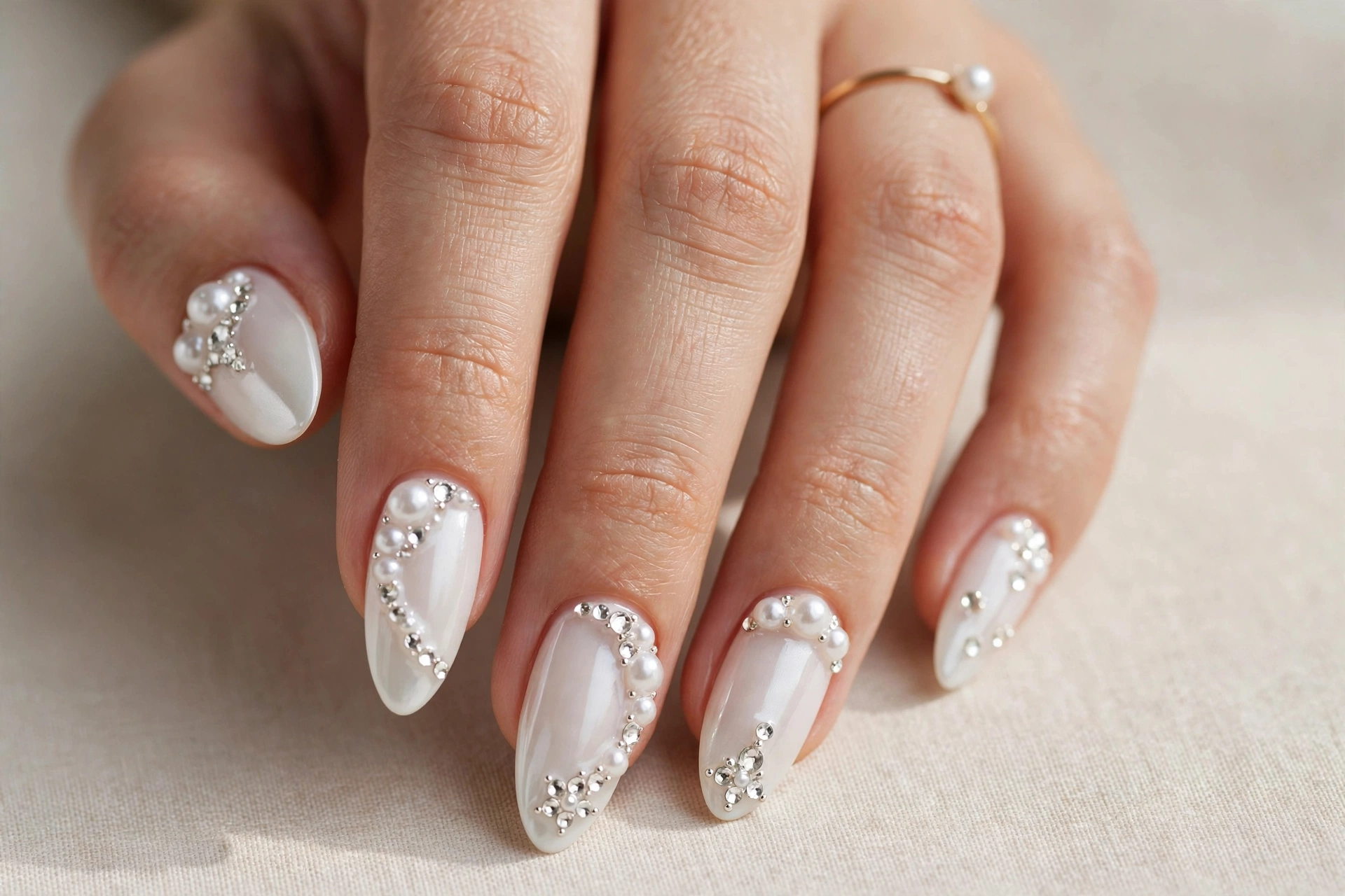 White nails with pearls and crystals