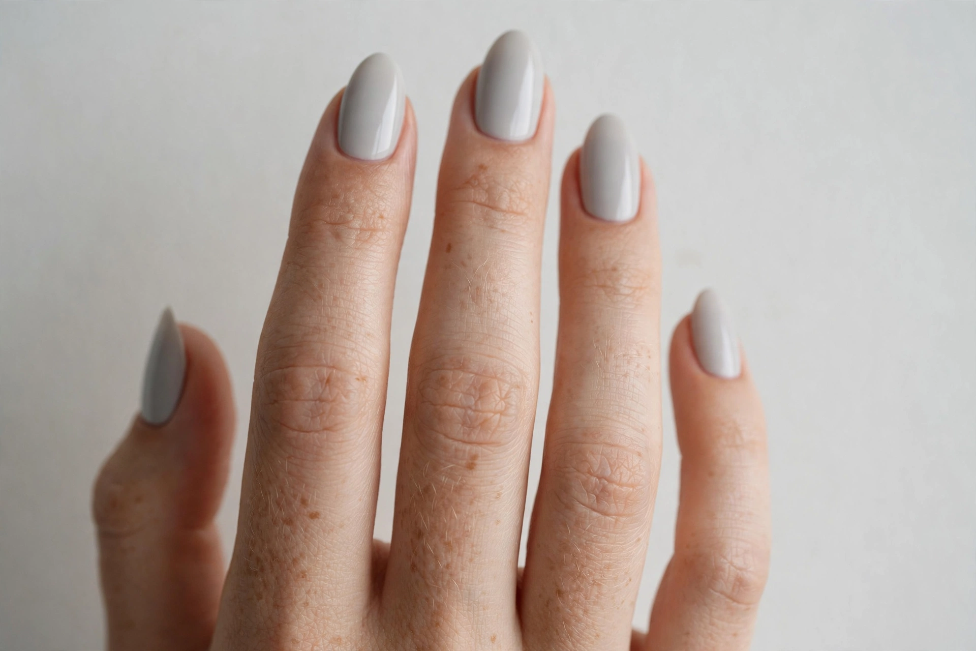 Soft gray minimalist nail manicure