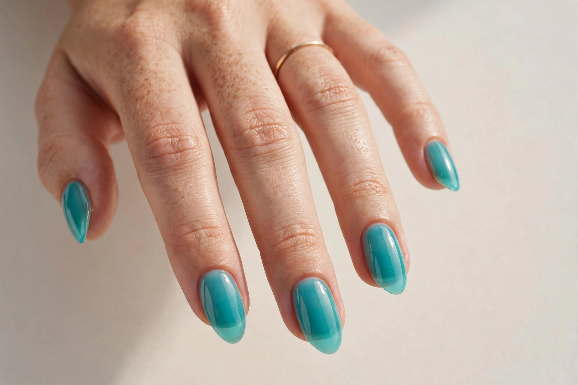 Turquoise jelly nails