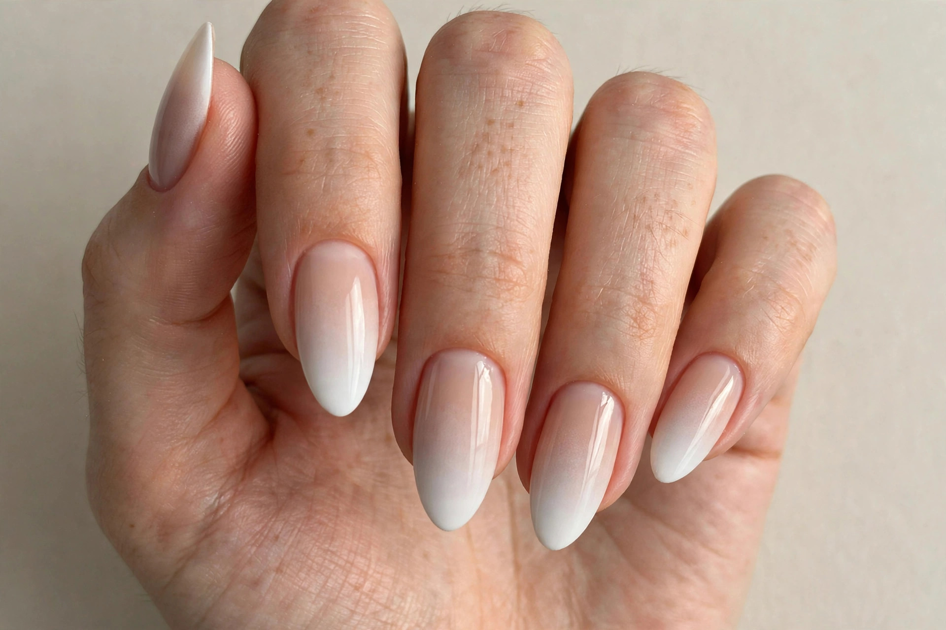 White ombre gradient fade nails from sheer to opaque white