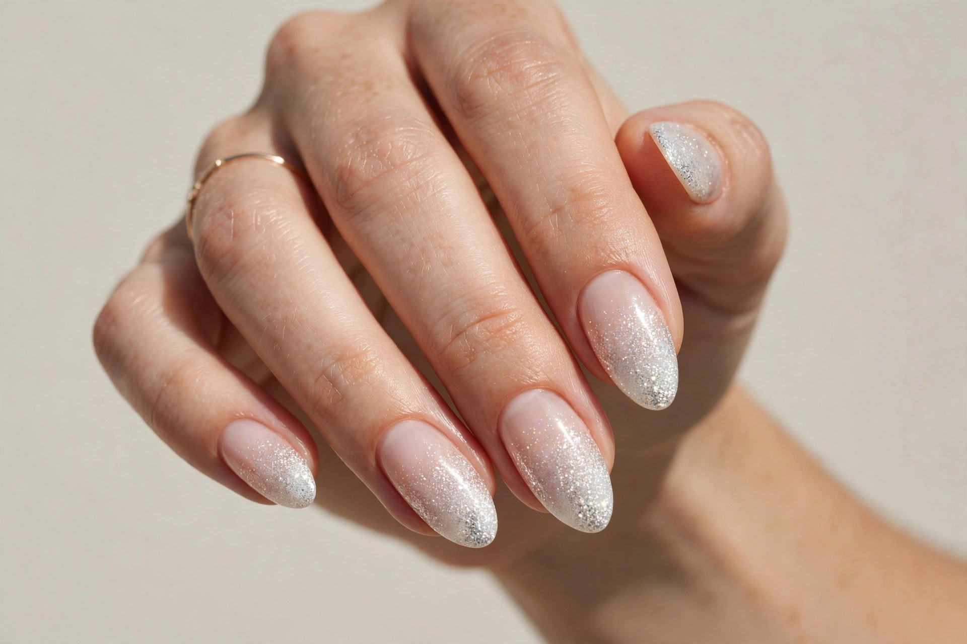 White glitter gradient sparkle nails fading from the tip